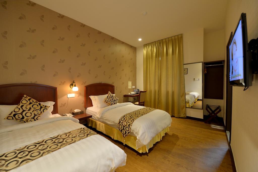 Asiana Hotel Kota Kinabalu Zimmer foto